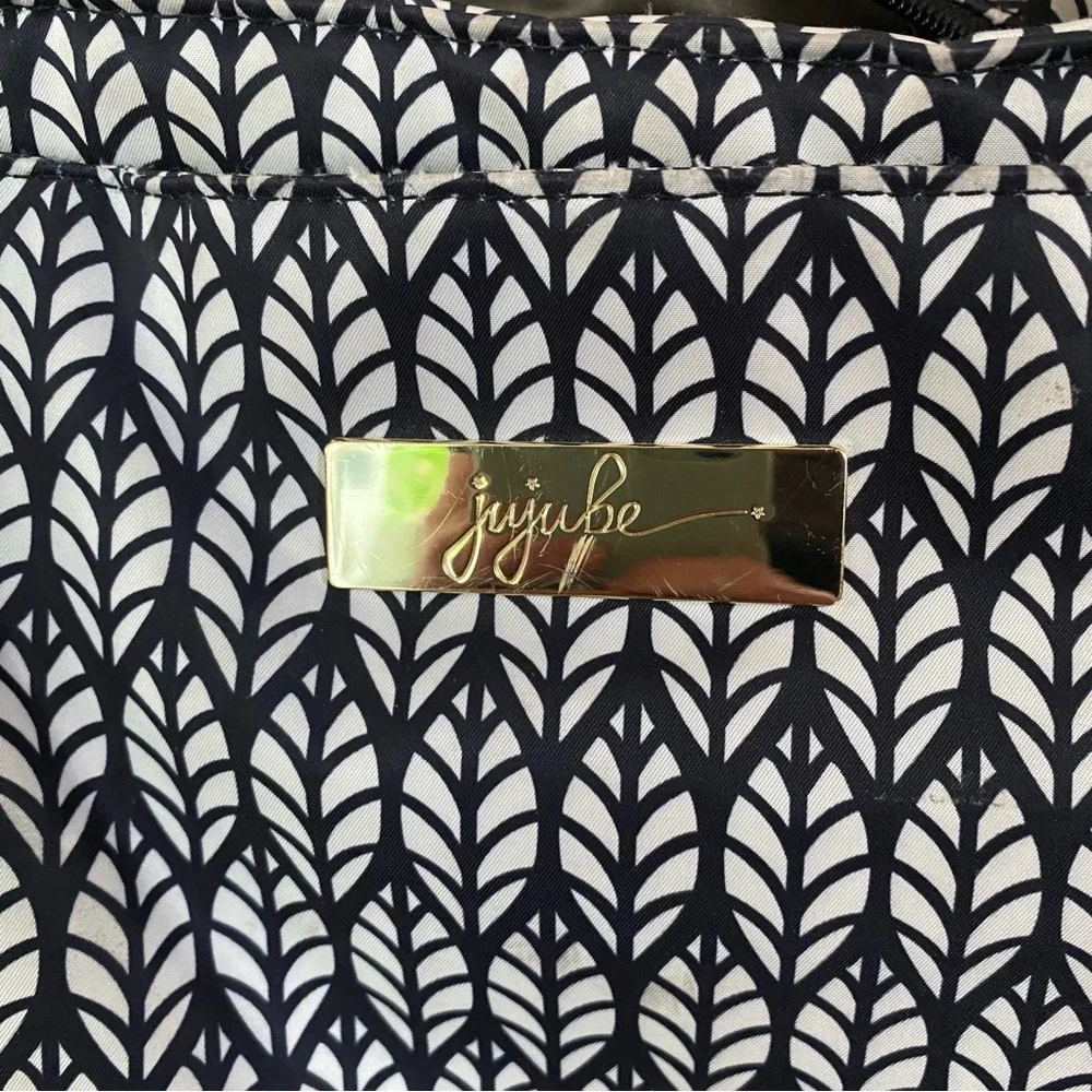 Jujube Be Classy spacious diaper bag tote for travel with black and white design
